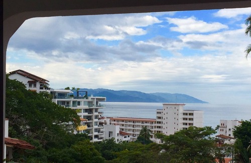 Romantic Zone Condo | Charming Romantica Zone condo-ocean and mountain views-minutes from the beach!