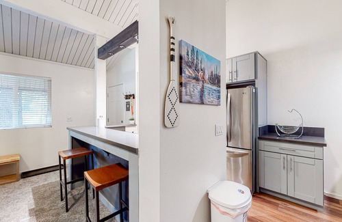 Mammoth Lakes Condo | Charming, two-story ski condo w/a wood stove, free WiFi, shared pool, & hot tub