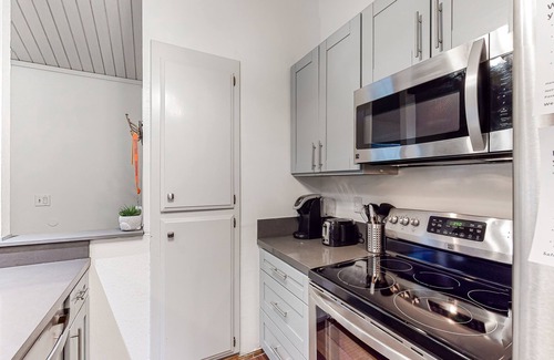 Mammoth Lakes Condo | Charming, two-story ski condo w/a wood stove, free WiFi, shared pool, & hot tub