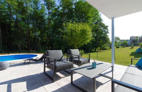 Zupanici Villa | Charming villa Prisca with pool and nice view of the wood