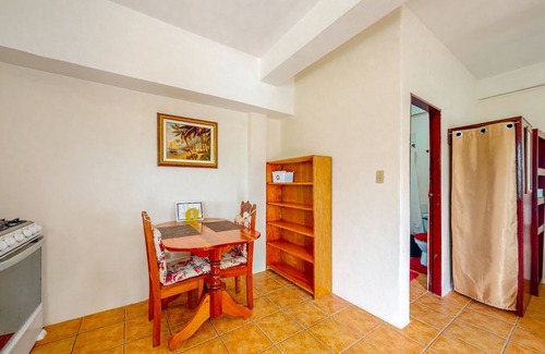 Caye Caulker Apartment | Cheerful, hotel-style studio w/WiFi, picnic table, partial AC & bikes to use