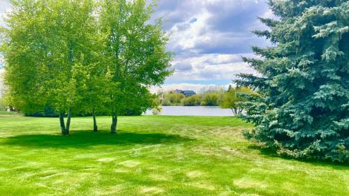 St. Anthony House | Chester Currents by KABINO Riverfront on Henrys Fork Air Conditioning Boat Launch Foosball Pool Table Huge Yard Garage WIFI