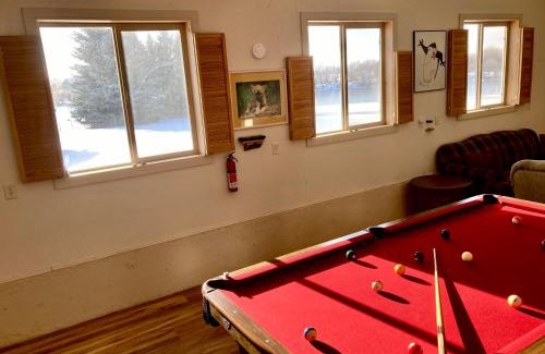 St. Anthony House | Chester Currents by KABINO Riverfront on Henrys Fork Air Conditioning Boat Launch Foosball Pool Table Huge Yard Garage WIFI
