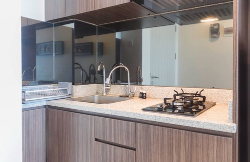 Pekayon Jaya Apartment | Chic And Cozy 2Br Grand Kamala Lagoon Apartment
