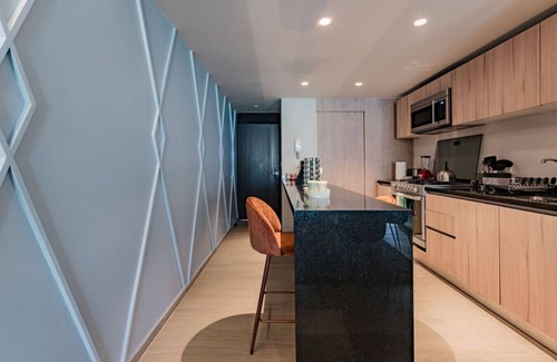 Del Valle Apartment | Chic Apartment with Tree-Lined Balcony Views & Parking