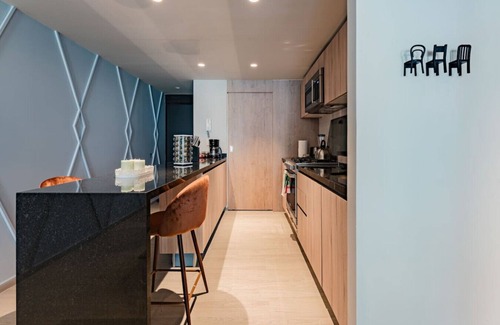 Del Valle Apartment | Chic Apartment with Tree-Lined Balcony Views & Parking
