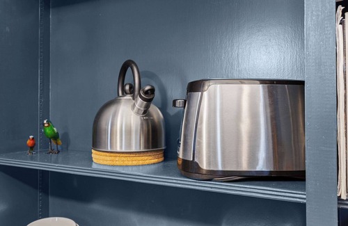 Cherokee Triangle Apartment | Chic Lou Studio | Cozy King Bed + Vibrant Location