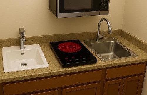 Wheatland Hotel | Citrus Extended Stay Suites OKC Airport