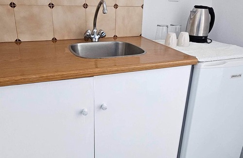 Perissa Apartment | Classic Quadruple Room 1 with Balcony and Air Conditioning