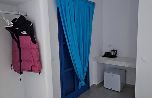 Perissa Apartment | Classic Quadruple Room 3 with Balcony and Air Conditioning