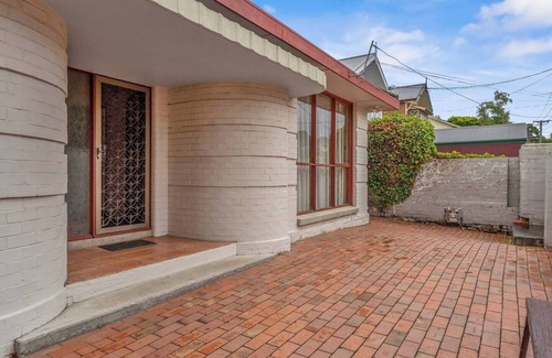 Sandy Bay House | Classic Retro Home Steps from Sandy Bays Best