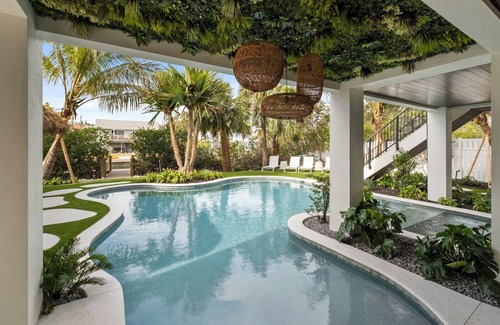 Anna Maria House | Coastal Elegance! Pool, Putting Green, Movie Room, and More!