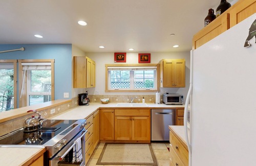 Shorepine Village House | Coastal home walking distance to the beach with outdoor shower & fireplace