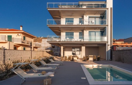 Capo d'Orlando Apartment | Cobalto - 2-bedroom apartment with large lateral sea view terrace and pool in the garden