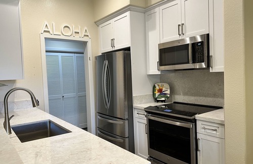 Ko Olina Condo | COCONUT PLANTATION! - GROUND FLOOR - NEAR BEACH - Optional GOLF CART!