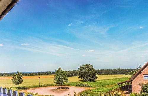 Bad Rehburg Apartment | Colorful vacation apartment with a view of the surrounding fields.