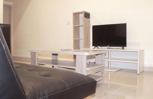 Cikarang Apartment | Comfort 1BR with Dining Room at Meikarta Apartment By Travelio