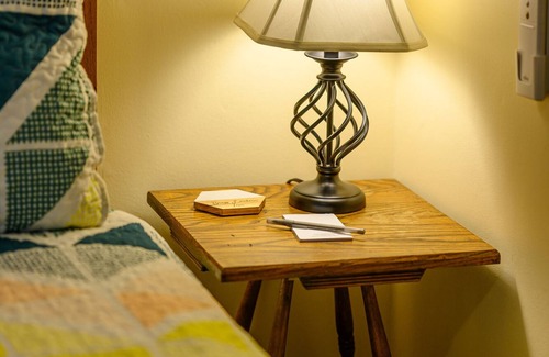 Stowe Bed & Breakfast | Comfortable budget room with queen bed, street view, and all-glass shower stall with full service breakfast included