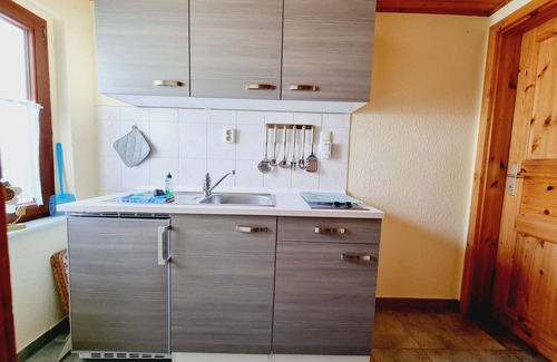 Wieck auf dem Darss Apartment | Comfortable room with garden access, modern furnishings and breakfast