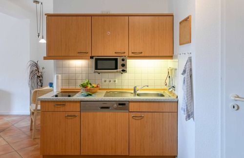 Neuensien Apartment | Comfortable vacation apartment with lake view and conservatory in the Seedorf vacation park