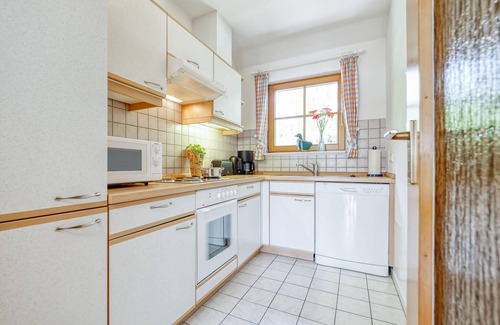 Zingst Apartment | Comfortable Windrose vacation apartment with balcony, pool and garden view in Zingst