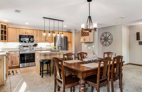 Arkdale Condo | Condo at waterfront resort with golf course views, central AC, W/D, & pool