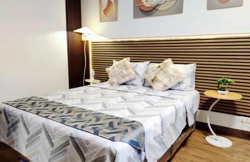 Mactan Export Processing Zone Apartment | Condo unit near Mactan Airport with Pool, Gym, Free WiFi, and Netflix