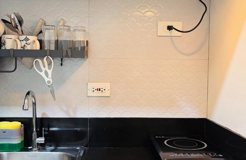 Iloilo Condo | Convenient City Hub with Relaxing Interior