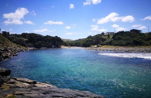 Lubanzi Village Cabin | CORAM DEO SaltyWaves double en-suite rooms with sea views