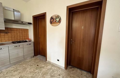 Gela Apartment | Cosy Abode: Apartment in the Square with View, Kitchen, and Exclusive Terrace