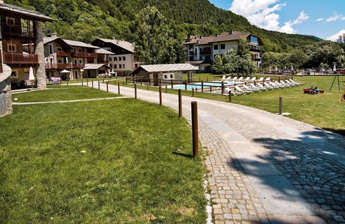 Sampeyre Apartment | Cosy apartment for 4 guests with pool, WIFI, TV, terrace and parking