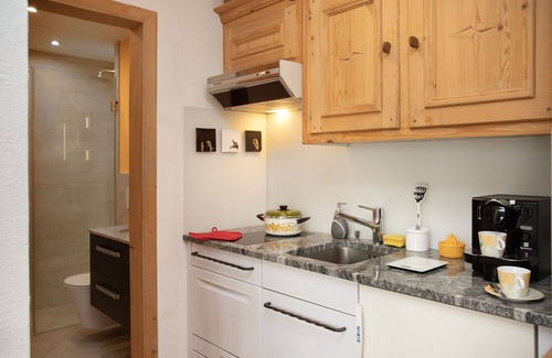 Falera Apartment | Cosy apartment for 4 people with pool, WIFI, TV, patio, pets allowed and panoramic view