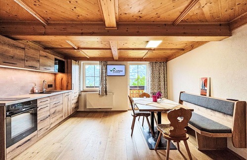 Ramsau am Dachstein Villa | Cosy apartment in villa for 3 guests with WIFI, TV, balcony, pets allowed and parking
