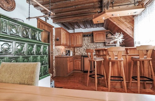 Oeblarn Villa | Cosy apartment in villa for 4 guests with WIFI, TV and balcony