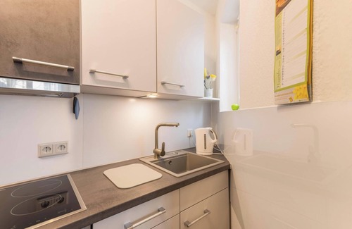 Horumersiel Apartment | Cosy Holiday Apartment “Am Horumertief” on Dyke with Wi-Fi, Terrace & Garden; Parking Available