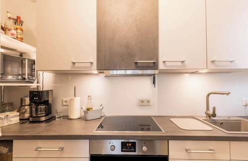 Horumersiel Apartment | Cosy Holiday Apartment “Am Horumertief” on Dyke with Wi-Fi, Terrace & Garden; Parking Available