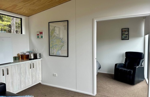 Moetapu Bay Cabin | Cosy modern two bedroom off-grid cabin, in the Marlborough Sounds