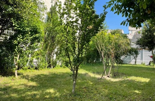 La Courneuve Apartment | Cosy N'est - Spacious apartment with garden just outside Paris.