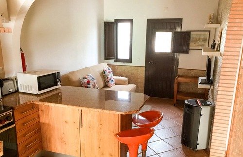 Aldeia de Brescos Cottage | Cottage 'Casas Da Lagoa - T2 Sul' with Private Garden, Balcony and Wi-Fi