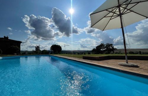 Bollano Apartment | Cottage con piscina immerso nel verde delle crete senesi