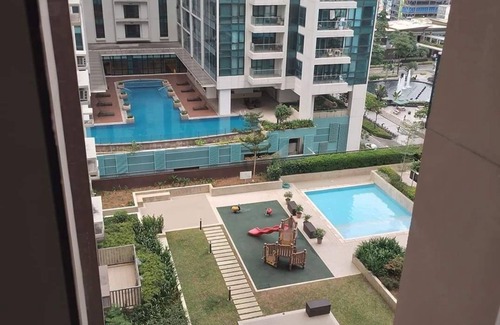 Makati Apartment | Cozy 1-bedroom apartment facing amenities with WiFi in upscale Uptown BGC Taguig