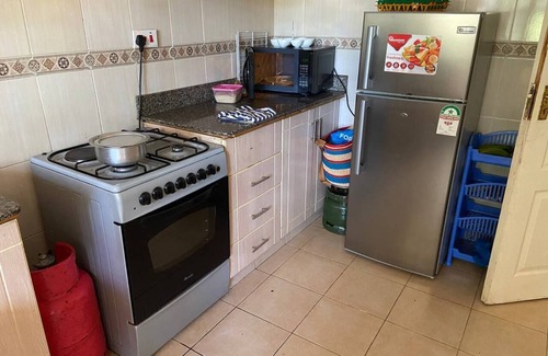 Nanyuki Apartment | Cozy 2-bedroom apartment with AC and WiFi in this wonderful home away from home.