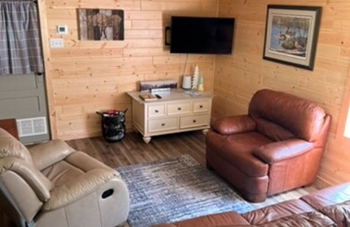 Rudyard Cabin | Cozy 2-bedroom cabin near endless trails. Family and pet friendly. Fire pit & AC