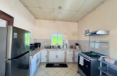 Izabal House | Cozy 2-bedroom house in welcoming Puerto Barrios with AC