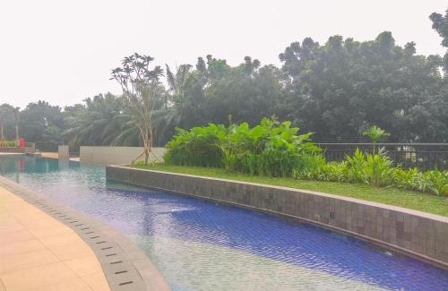 Pinang Apartment | Cozy 2BR Transpark Cibubur Apartment near Mall By Travelio