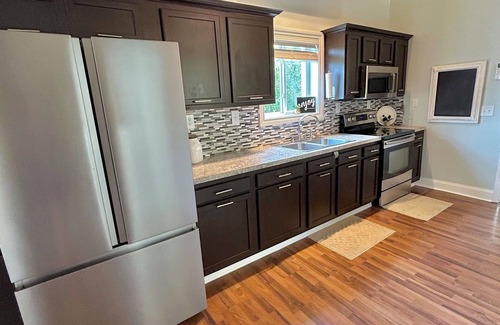 Greenville House | Cozy 3-bedroom lake house with private beach area and fire pit in Greenville