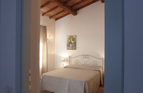Tarquinia Other | Cozy apartment on two levels with private porch.