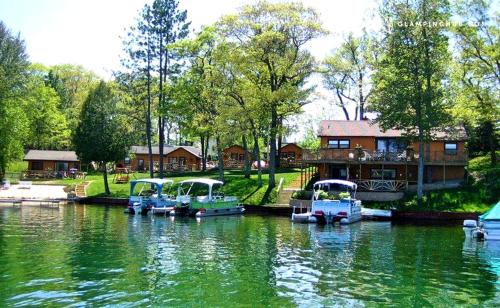 West Branch House | Cozy Cabin Rental with Stunning Lake Views in West Branch, Michigan