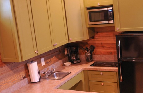 New Braunfels Cabin | Cozy Cabins near the Comal River- Cabin #2- Military Theme. Walk to Wurstfest