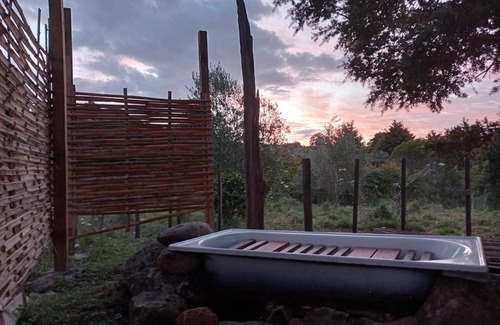 Waimate North House | Cozy caravan retreat with great views set within 10 acre of ecological paradise.